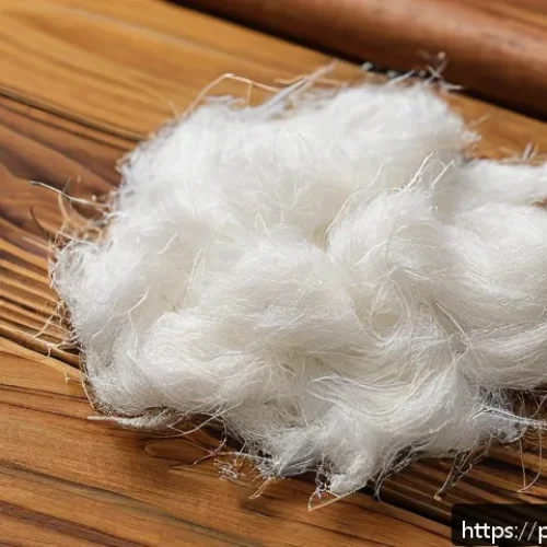 섬유기사 시험 출제 유형 분석 - A detailed close-up image of various textile fibers laid out on a wooden table, showing natural fibe...